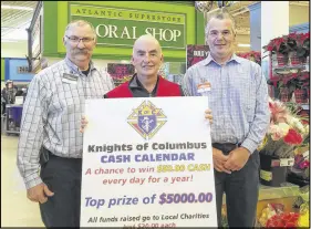  ?? SUBMITTED PHOTO ?? The Truro Knights of Columbus will be seen regularly at Truro’s Atlantic Superstore this holiday season, where they are selling calendars as a fundraiser for local charities. More than $27,000 in prizes will be available through six provincial Knights of Columbus councils. From left, Glenn Langille, Atlantic Superstore assistant manager, Brian Buckley of the Knights of Columbus and Joe Gould, Truro Atlantic Superstore manager.