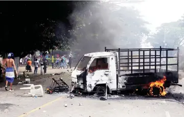  ??  ?? View of a burnt truck during protests in Masaya, some 40km southeast of Managua. —AFP photo