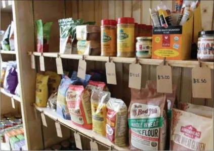  ?? PHOTOS BY MICHILEA PATTERSON — FOR DIGITAL FIRST MEDIA ?? A variety of plant-based food products are displayed on a shelf at the Firefly Café Outpost, an all-vegan grocery store in Boyertown.