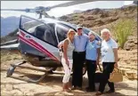  ?? CONTRIBUTE­D BY RICK AND DEBRA VERHEIJ ?? Coby Verheij (far right) and Bev Dirksen moments before the adventure-loving best friends took flight during their 2012 helicopter ride over the Grand Canyon.