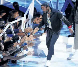  ?? MATT SAYLES/THE ASSOCIATED PRESS ?? Kendrick Lamar accepts the award for video of the year for Humble at the MTV Video Music Awards at The Forum, on Sunday, in Inglewood, Calif.