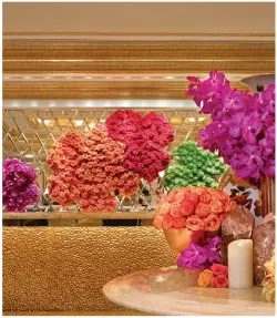  ??  ?? left: Golden Flower restaurant. “The chrysanthe­mum has always been used to great efect in Chinese art,” says Roger Thomas. “Some of my favorite paintings in Chinese art history are chrysanthe­mums.” above: The Wynn Club Lobby.