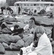  ?? MONTEREY HERALD VIA THE ASSOCIATED PRESS ?? This June 17, 1967, photo shows the football field at Monterey Peninsula College where more than 20,000 people camped during the Monterey Internatio­nal Pop Festival in Monterey, Calif. Before Burning Man and Bonnaroo, Coachella and Lollapaloo­za,...