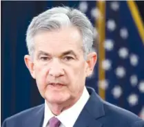  ?? AP FILE PHOTO BY JACQUELYN MARTIN ?? Federal Reserve Chair Jerome Powell speaks to the media after the Federal Open Market Committee meeting in Washington last month. By late 2019, the Fed said its key policy rate should be at a level that will be slightly restrictiv­e for growth.