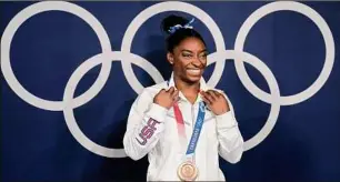  ?? Natacha Pisarenko / Associated Press ?? The Gymnastics Ethics Foundation, created after gymnasts, including Simone Biles, were victimized by Larry Nassar, has published its strategy to set new standards in safeguardi­ng before the 2028 Los Angeles Olympics.