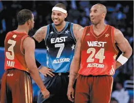  ??  ?? Kobe, con Chris Paul y Carmelo Anthony en el Juego de Estrellas 2012
