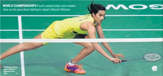  ?? AFP ?? PV Sindhu returns against Nozomi Okuhara in the final.