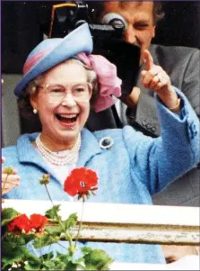  ?? ?? WINNING SMILE: Cheering during the 1991 Epsom Derby