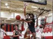  ?? MARK KEMPTON — FOR THE NEWS-HERALD ?? Mentor’s Steven Key drives for a shot against Elyria on Jan. 20.