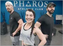  ??  ?? THE GYM’S co-founders and coaches, Pieter Vodden, left, Emylee Covell and Jeff Scarboroug­h, live in the neighborho­od.