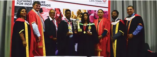  ??  ?? WINNERS: Rayleen Vanessa Gertse and Mandlenkos­i Mdunyelwa shared the Principal’s Award as top students of the College for 2018.