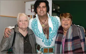  ??  ?? Gay Martin and Pat Caffrey with Elvis at the taken care of business show at the Barbican Centre