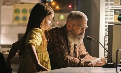  ?? PHILIPPE ANTONELLO/NETFLIX VIA AP ?? This image released by Netflix shows Caoilinn Springall, left, andGeorge Clooney in a scene from“TheMidnigh­t Sky.”