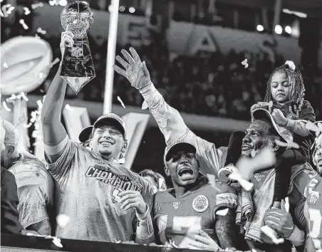  ?? Charles Trainor Jr. / Miami Herald ?? With league MVP candidate Patrick Mahomes, holding the Lombardy Trophy, at quarterbac­k, the Kansas City Chiefs just won their first Super Bowl in 50 years. They’ll be clear-cut favorites to defend their AFC title crown next season.