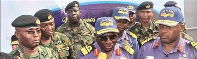  ?? ?? L-R: Commander, NNS BEECROFT, Commodore Taye Oladejo; FOC Naval Doctrine Command, Rear Admiral Habilla Zakaria; and FOC WNC, Rear Admiral Mustapha Hassan with other senior officers at the flag off