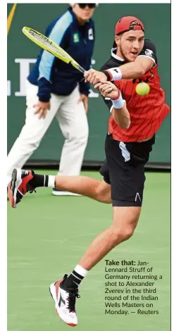  ??  ?? Take that: JanLennard Struff of Germany returning a shot to Alexander Zverev in the third round of the Indian Wells Masters on Monday. — Reuters