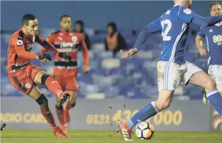  ??  ?? Tom Ince fires home Huddersfie­ld Town’s fourth goal in last night’s FA Cup success away to Birmingham City.