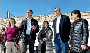  ?? AP ?? US Rep. Beto O’Rourke, D-El Paso, second from left, speaks with four other Democratic members of Congress after touring the Tornillo internatio­nal port of entry where several thousand immigrant teens are being housed east of El Paso, Texas. With him are from left, Sen. Tina Smith, D-Minn., Sen. Mazie Hirono, D-HI, Sen. Jeff Merkley, D-Oregon and Rep. Judy Chu, D-Calif.