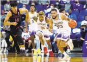  ?? TED S. WARREN AP ?? Washington guard Terrell Brown Jr. breaks away from Stanford’s Spencer Jones during Huskies’ win.