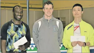  ?? SUBMITTED PHOTO ?? Patrick Thompson, second left, and Kevin Yan, right, finished second in A men’s doubles at the recent 2017 Atlantic badminton championsh­ips in Truro, N.S. The nova Scotia team of Elliott Beals, left, and Spencer Armsworthy, missing from photo, won the...