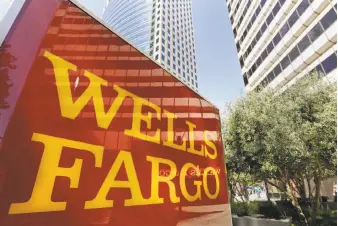  ?? Ben Margot / Associated Press 2014 ?? Wells Fargo reportedly is the main bank for the National Rifle Associatio­n and the largest financier of the gun industry, having loaned the industry hundreds of millions of dollars.