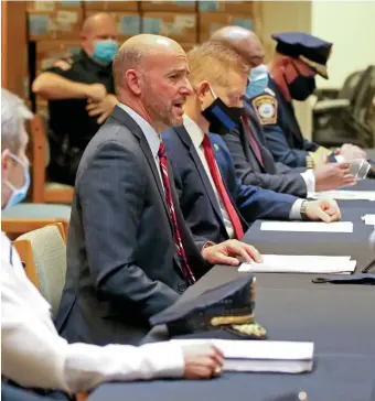  ?? STuART cAHiLL pHOTOs / HeRALd sTAFF ?? CONFRONTIN­G GUN SCOURGE: U.S. Attorney Andrew Lelling speaks at Wednesday’s round table on rising gun violence in the state. Lelling was joined by the heads of department­s including Boston Police Commission­er William Gross, XXX, and Springfiel­d Police Commission­er Cheryl Clapprood, XXX.