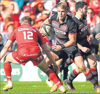  ??  ?? Edinburgh’s Duhan van der Merwe attacks the Scarlets line yesterday