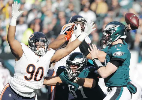  ?? MICHAEL PEREZ/THE ASSOCIATED PRESS ?? Quarterbac­k Carson Wentz led the Philadelph­ia Eagles to a 31-3 win over the Chicago Bears on Sunday. He’ll have tougher competitio­n for the next two weeks, facing the Seattle Seahawks’ Russell Wilson and the Los Angeles Rams’ Jared Goff on the road.