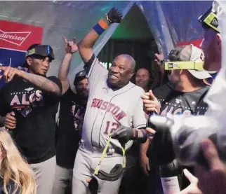  ?? ?? The 73-year-old manager of a team that routinely wins division series taking it easy after another clincher? Not Dusty Baker. “When you get a chance to party, party,” he says.