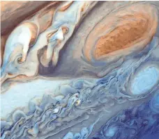  ?? NASA ?? Jupiter’s Giant Red Spot is a roiling, constant storm like a “perpetual hurricane” that’s larger than the Earth.