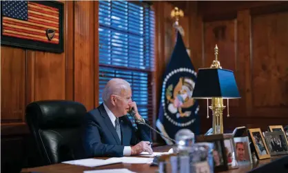  ?? Photograph: AFP/Getty Images ?? In this image provided by the White House, Joe Biden speaks on the phone to his Russian counterpar­t Vladimir Putin on Thursday.