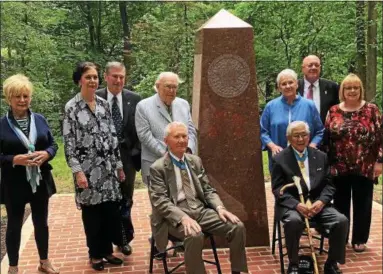  ?? SUBMITTED PHOTO ?? Medal of Honor recipients (seated from left) Gen. James Livingston (Marines, Vietnam) and Hiroshi Miyamura (Army, Korea) pose in the refurbishe­d Oklahoma Area of the Medal of Honor Grove with members of Freedoms Foundation­s Oklahoma City Chapter.