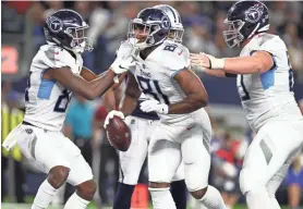  ?? MATTHEW EMMONS-USA TODAY SPORTS ?? Titans tight end Jonnu Smith (81) celebrates his third-quarter touchdown Monday.