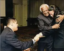  ?? CONTRIBUTE­D ?? South African cleric and human rights activist Desmond Tutu blessed the future union of the Alvarados.