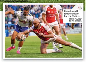  ?? STEVE FLYNN/ NEWS IMAGES ?? Kane Linnett touches down for the Robins