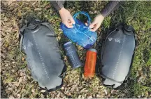  ?? Michael Macor / Special to The Chronicle ?? Banas carried more than 6 gallons of water in bladders and bottles during his 167-mile solo trek across Death Valley National Park, with no water available.