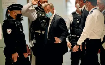  ?? AP ?? Former French President Nicolas Sarkozy arrives at the courtroom in Paris yesterday.