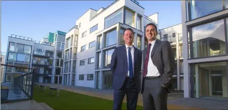  ??  ?? Cormac Pettitt (right) and group managing director Philip Gavin at the Talbot Suites, purchased and developed with a €10m investment.