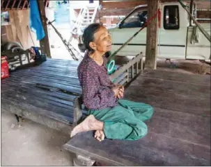  ?? CHARLOTTE PERT ?? Accused war criminal Im Chaem sits at a house in Oddar Meanchey’s Anlong Veng district in 2014.