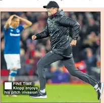  ??  ?? FINE TIME: Klopp enjoys his pitch invasion