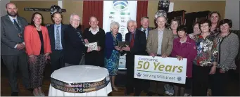  ??  ?? Above: Founders of Millstreet Credit Union Ted Kiely and Der Kiely receive presentati­ons from Liam Coffey and Anne Cowman in the company of colleagues and Mallow Credit Union Board of Management at the 50th Anniversar­y of Millstreet Credit Union.