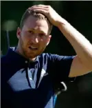  ?? Tom Pennington/Getty Images ?? “It was a little different for sure, but in the end, I was holding the trophy,” Daniel Berger said.