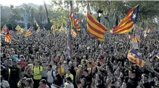  ?? MANU FERNANDEZ/THE ASSOCIATED PRESS ?? People shout slogans during a protest in Barcelona, Spain, Thursday. Thousands have gathered at the gates of Catalonia’s judiciary body in Barcelona to demand the release of a dozen officials arrested in connection with a vote on independen­ce that...