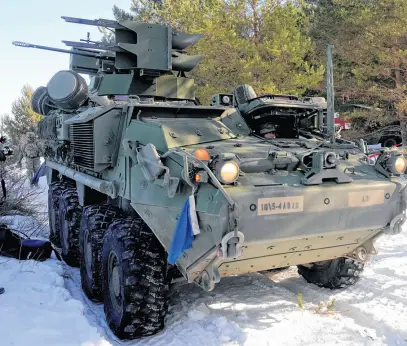  ?? REUTERS ?? U.S. troops prepare to fire Stinger missiles from their Stryker armored fighting vehicle during Saber Strike military drill in Rutja, Estonia, March 10, 2022.