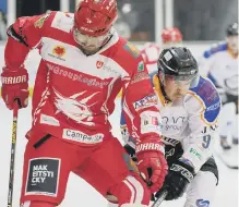  ??  ?? Phantoms player Nathan Salem battles with Swindon’s Aaron Nell.