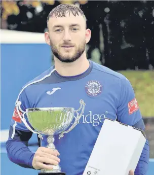  ?? Frank Crook ?? Mason Fawns with his Player of the Month award for September