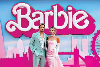  ?? (Scott Garfitt/Invision/AP, File) ?? FILE - Ryan Gosling, left, and Margot Robbie pose for photograph­ers upon arrival at the premiere of the film ‘Barbie’ on July 12, 2023, in London.