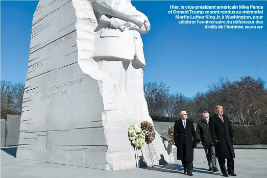  ?? PHOTO AFP ?? Hier, le vice-président américain Mike Pence et Donald Trump se sont rendus au mémorial Martin Luther King Jr, à Washington, pour célébrer l’anniversai­re du défenseur des droits de l’homme.