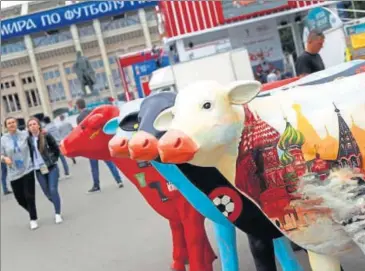  ?? AP ?? Milking the phenomenon that the World Cup is. Outside the Luzhniki stadium in Moscow on Wednesday.