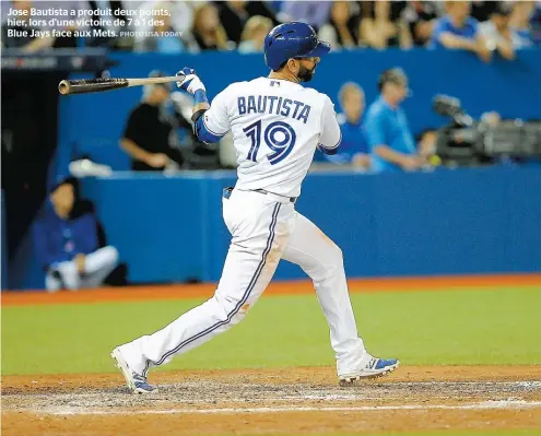  ??  ?? Jose Bautista a produit deux points, hier, lors d’une victoire de 7 à 1 des Blue Jays face aux Mets.